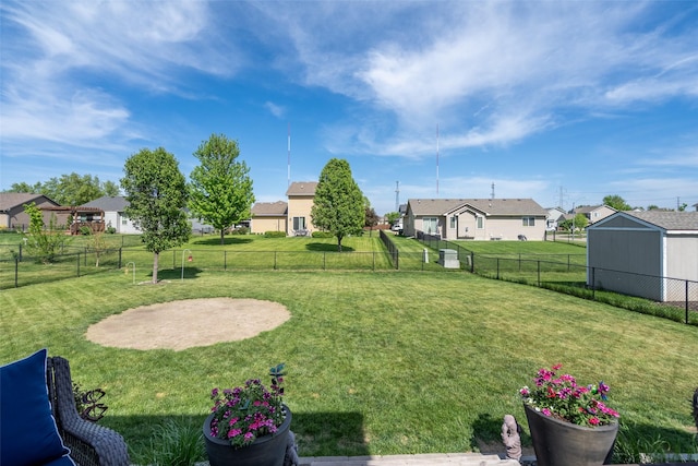 view of yard featuring a residential view