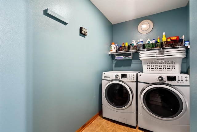 washroom featuring washing machine and dryer