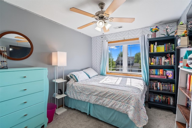 carpeted bedroom featuring ceiling fan