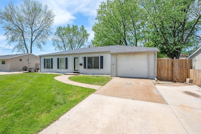 ranch-style home featuring driveway and a garage