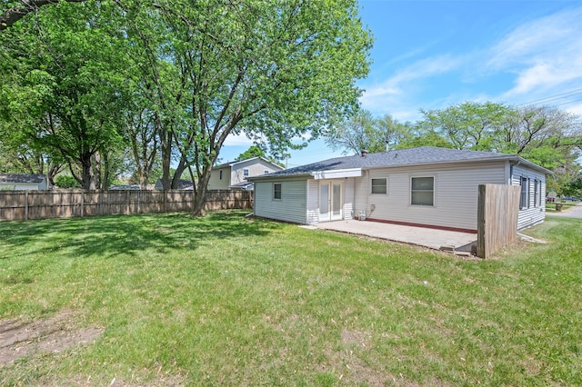 back of house featuring french doors and a patio