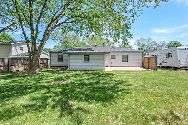 rear view of property with a patio area