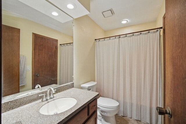 7052 Plum Dr, Urbandale, IA 50322 - full bath with vanity and toilet