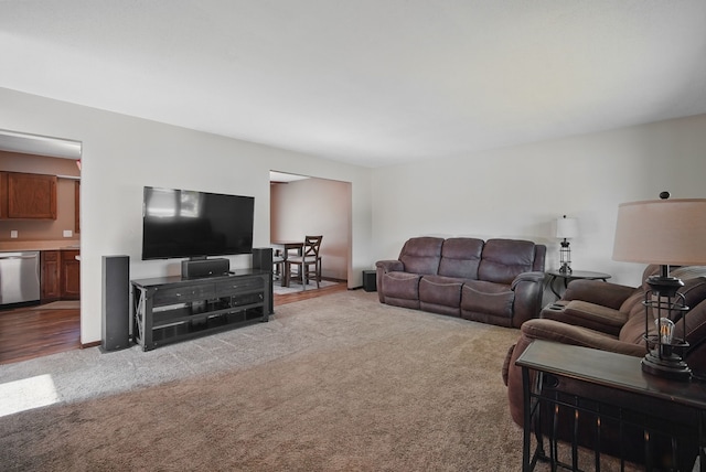 7052 Plum Dr, Urbandale, IA 50322 - living room featuring carpet