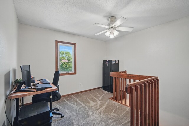 7052 Plum Dr, Urbandale, IA 50322 - office space featuring carpet, a ceiling fan, baseboards, and a textured ceiling