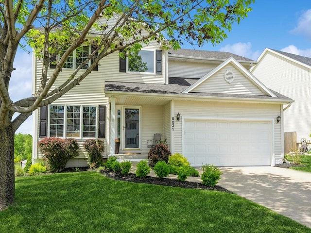 5031 Cherrywood Dr, West Des Moines, IA 50265 - traditional-style home with concrete driveway, a front yard, an attached garage, and roof with shingles