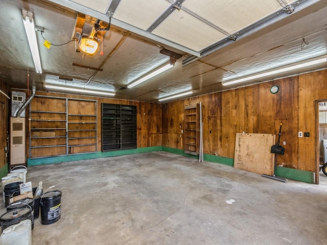 garage featuring wooden walls