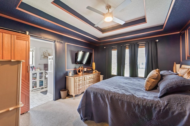 3905 NW 4th St, Ankeny, IA 50023 - bedroom featuring a raised ceiling, carpet, ornamental molding, and a ceiling fan