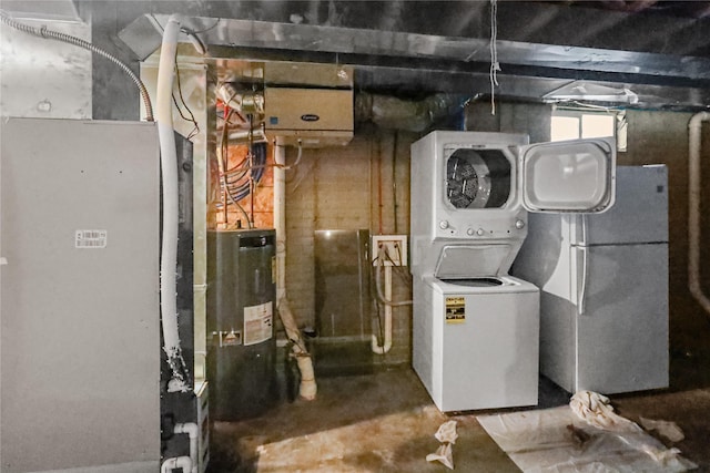 1424 Cleveland Ave, Des Moines, IA 50316 - utilities with stacked washer and clothes dryer and water heater