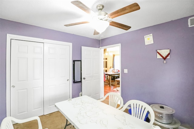 1424 Cleveland Ave, Des Moines, IA 50316 - dining space with a ceiling fan and light colored carpet