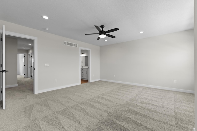 1998 S Warrior Ln, Waukee, IA 50263 - unfurnished bedroom with carpet, recessed lighting, baseboards, and ensuite bath