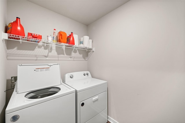 9556 Crestview Dr, West Des Moines, IA 50266 - laundry room featuring washing machine and clothes dryer and baseboards
