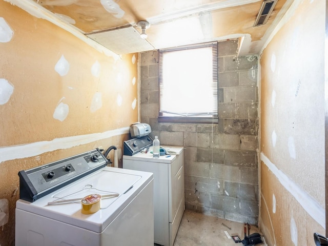 washroom featuring separate washer and dryer