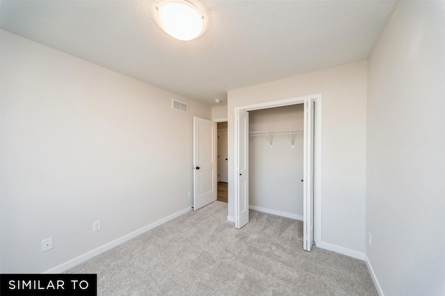 4404 NE 8th St, Ankeny, IA 50021 - unfurnished bedroom featuring carpet, baseboards, and a closet