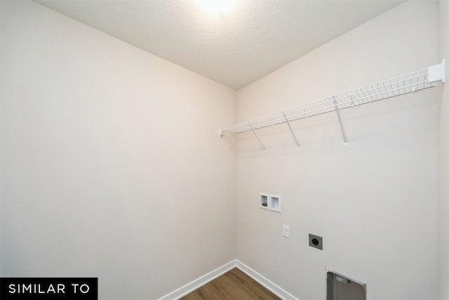 4404 NE 8th St, Ankeny, IA 50021 - clothes washing area featuring hookup for an electric dryer, washer hookup, baseboards, and dark wood finished floors