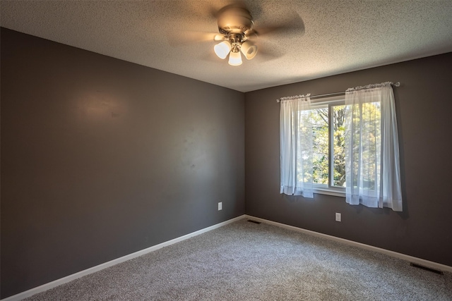 15046 Summit Dr, Clive, IA 50325 - unfurnished room featuring ceiling fan, carpet, and a textured ceiling