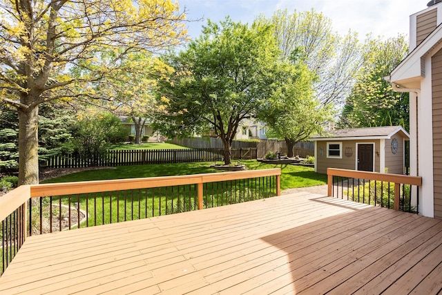 15046 Summit Dr, Clive, IA 50325 - wooden deck featuring a fenced backyard and an outbuilding