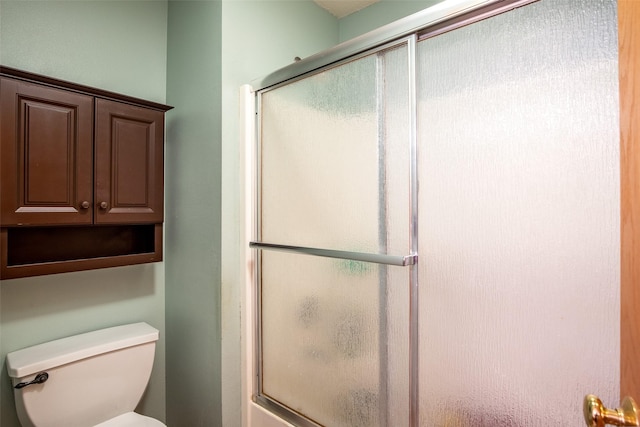 1509 SE Delaware Ave Unit 10, Ankeny, IA 50021 - full bath featuring a shower with door and toilet