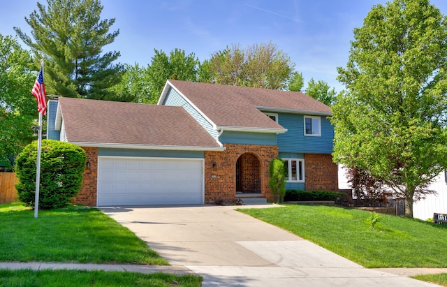 10476 Ricardo Rd, Clive, IA 50325 - view of front facade featuring brick siding, an attached garage, driveway, and a front lawn