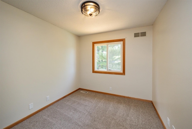 10476 Ricardo Rd, Clive, IA 50325 - spare room featuring carpet and baseboards
