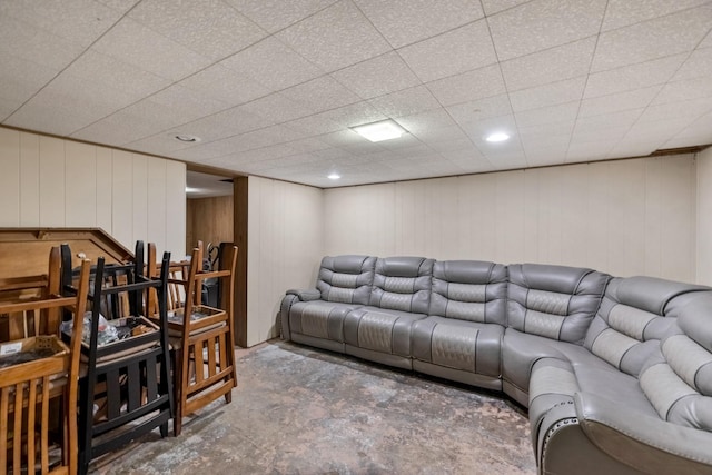 910 Washington St, Eldora, IA 50627 - living area featuring unfinished concrete floors