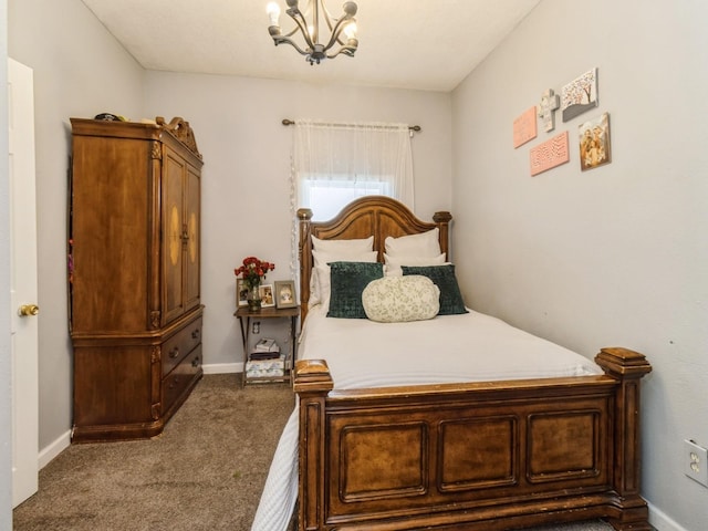 1273 E 18th St, Des Moines, IA 50316 - bedroom featuring a chandelier, carpet flooring, and baseboards