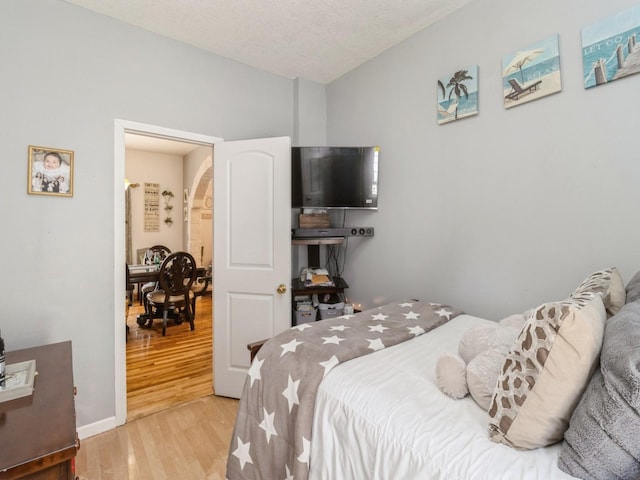 1273 E 18th St, Des Moines, IA 50316 - bedroom featuring light wood-type flooring