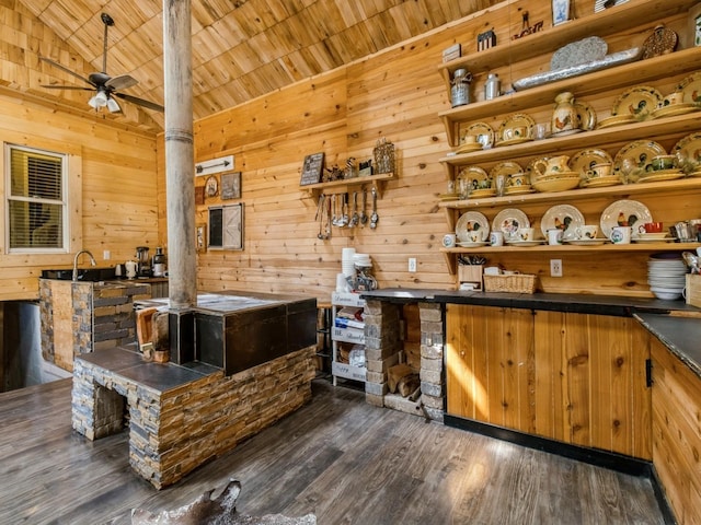 1273 E 18th St, Des Moines, IA 50316 - bar with a ceiling fan, wooden walls, dark wood-type flooring, wooden ceiling, and lofted ceiling