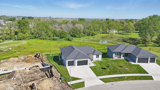 425 NW Woodmoor Dr, Waukee, IA 50263 - aerial view of property and surrounding area with a nearby body of water