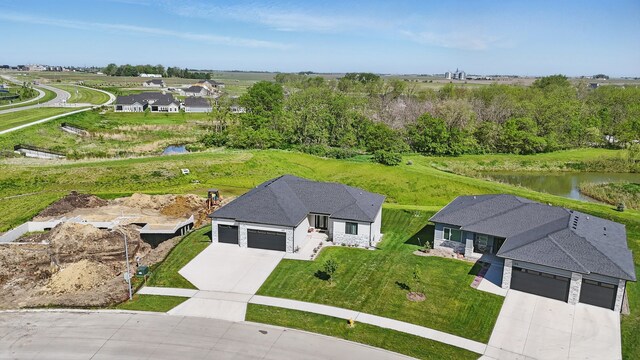 425 NW Woodmoor Dr, Waukee, IA 50263 - aerial view of property and surrounding area with a nearby body of water