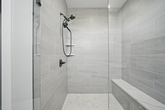 425 NW Woodmoor Dr, Waukee, IA 50263 - full bathroom featuring tiled shower