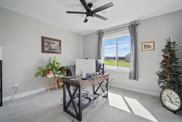 425 NW Woodmoor Dr, Waukee, IA 50263 - home office featuring carpet, ceiling fan, and baseboards