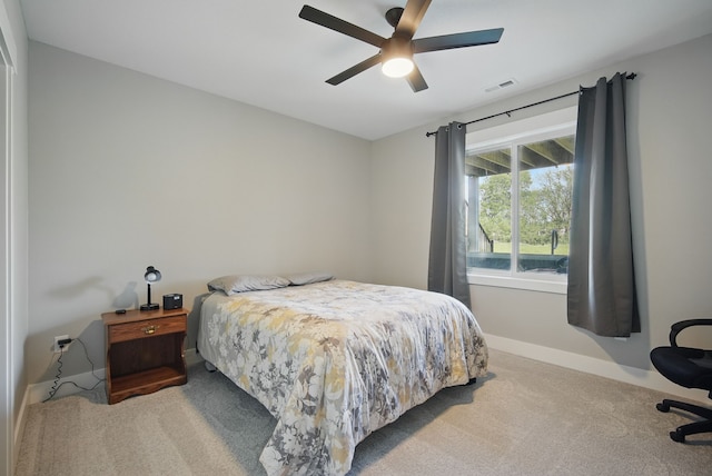 425 NW Woodmoor Dr, Waukee, IA 50263 - carpeted bedroom featuring baseboards and a ceiling fan