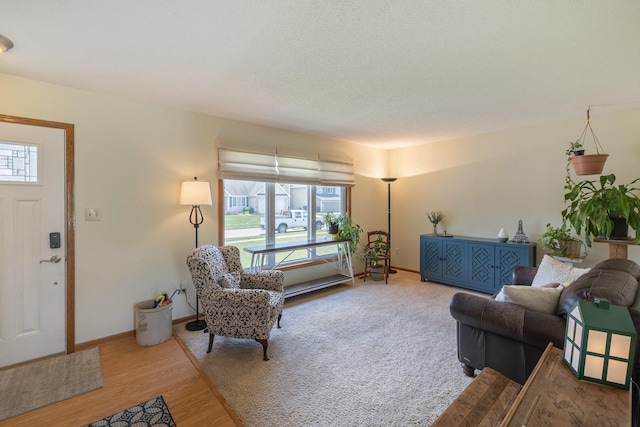 8123 Brookview Dr, Urbandale, IA 50322 - living area featuring wood finished floors and baseboards