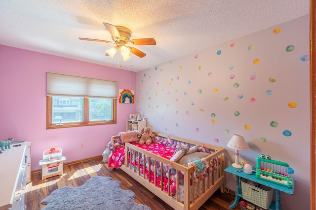 8123 Brookview Dr, Urbandale, IA 50322 - bedroom with a textured ceiling, wood finished floors, and ceiling fan