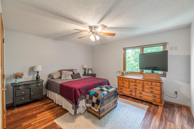 8123 Brookview Dr, Urbandale, IA 50322 - bedroom with wood finished floors, ceiling fan, and a textured ceiling
