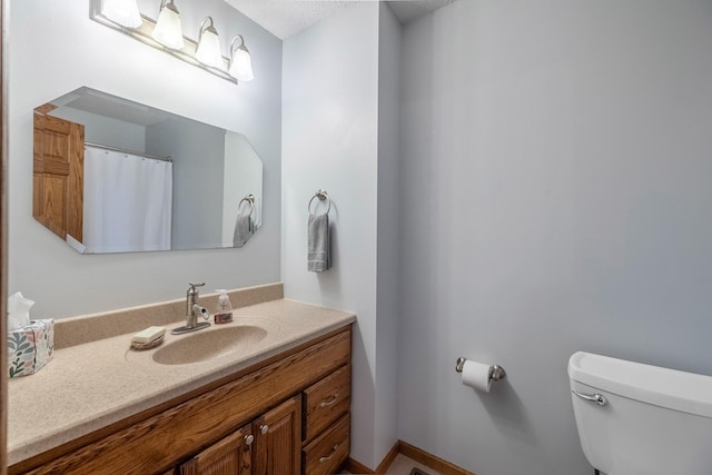 8123 Brookview Dr, Urbandale, IA 50322 - bathroom featuring toilet and vanity