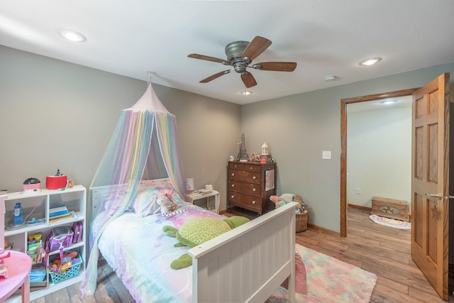 8123 Brookview Dr, Urbandale, IA 50322 - bedroom featuring wood finished floors, recessed lighting, and a ceiling fan
