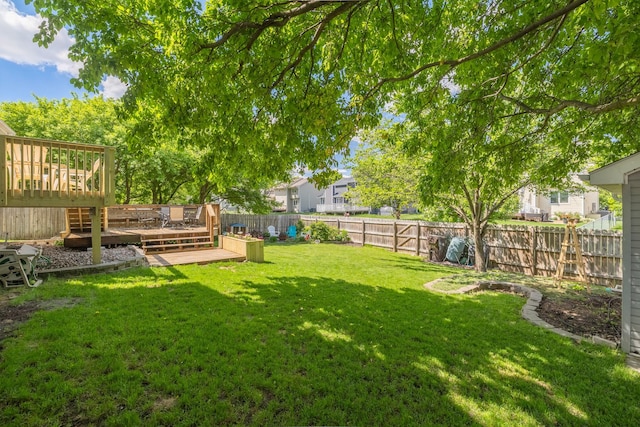 8123 Brookview Dr, Urbandale, IA 50322 - fenced backyard with a deck