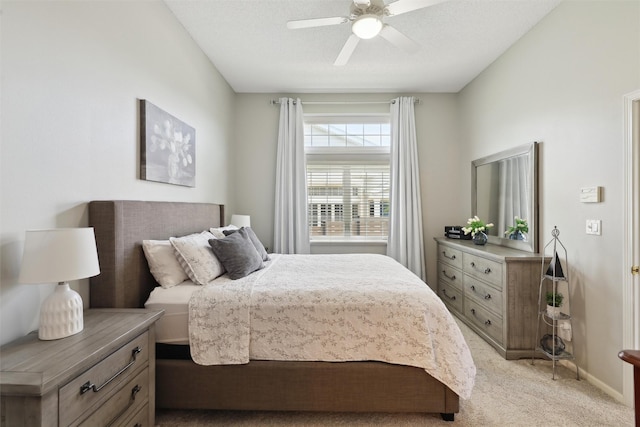 4400 Ep True Pkwy Unit 51, West Des Moines, IA 50265 - bedroom with light colored carpet, a ceiling fan, and baseboards