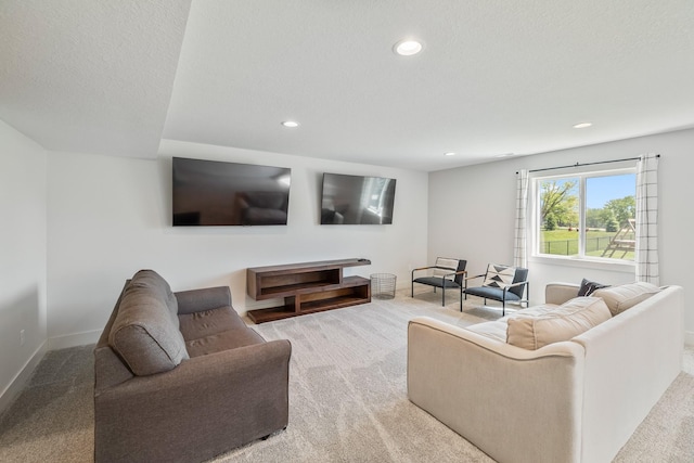 living room featuring light colored carpet, recessed lighting, and baseboards