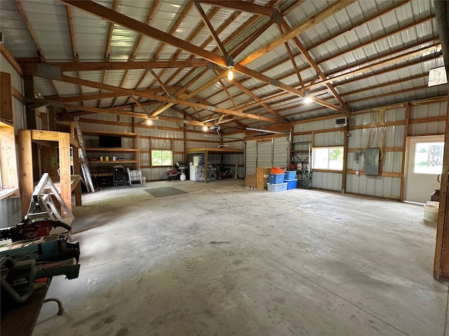 711 E Madison St, Winterset, IA 50273 - garage featuring electric panel and metal wall