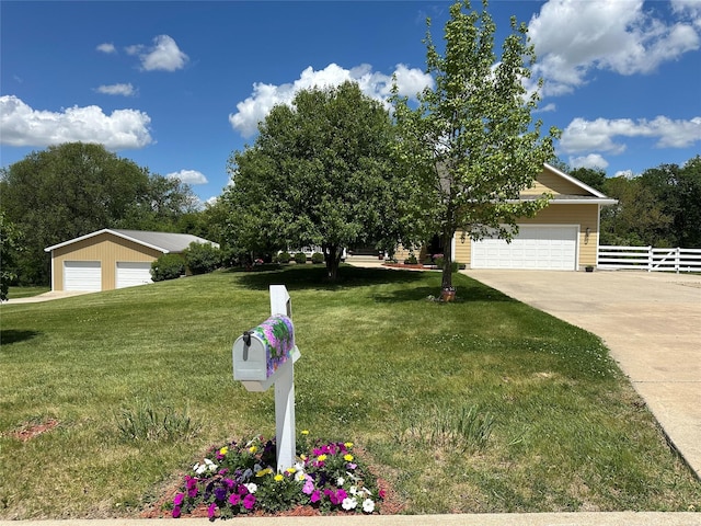 711 E Madison St, Winterset, IA 50273 - view of front of home with a detached garage