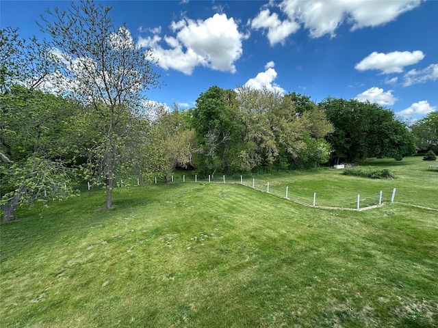 711 E Madison St, Winterset, IA 50273 - view of yard featuring a rural view