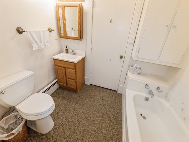 820 Main St, Norwalk, IA 50211 - bathroom with baseboard heating, toilet, a tub to relax in, decorative backsplash, and vanity
