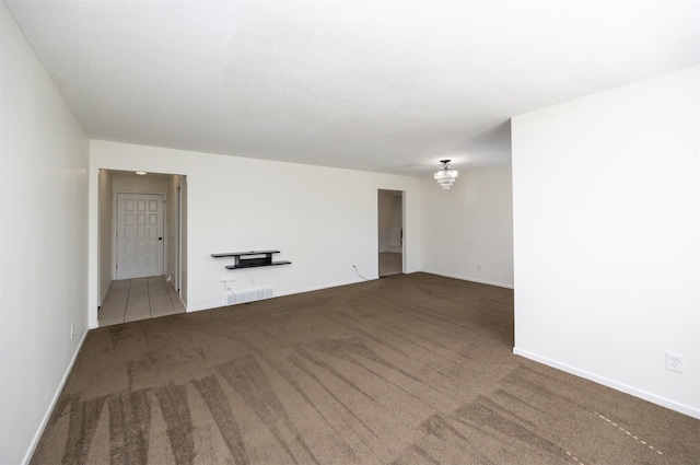 1667 NW 93rd Ct, Clive, IA 50325 - empty room with carpet floors and baseboards