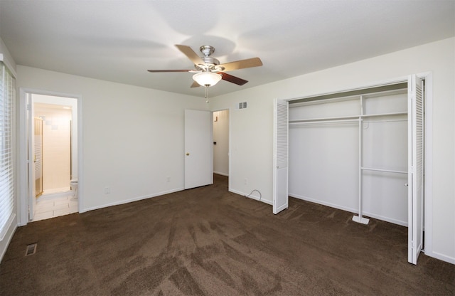 1667 NW 93rd Ct, Clive, IA 50325 - unfurnished bedroom with carpet flooring, a closet, a ceiling fan, and baseboards
