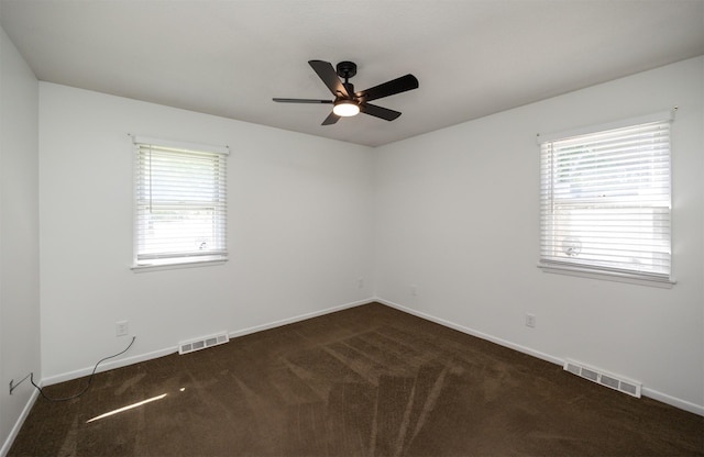 1667 NW 93rd Ct, Clive, IA 50325 - carpeted empty room featuring healthy amount of natural light, ceiling fan, and baseboards