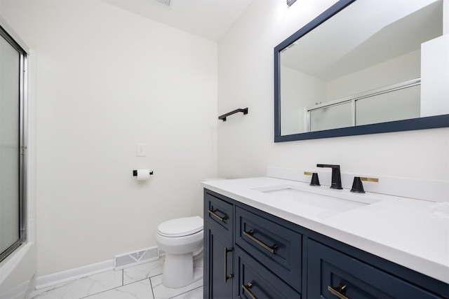 1667 NW 93rd Ct, Clive, IA 50325 - bathroom featuring marble look tile flooring, baseboards, toilet, and vanity