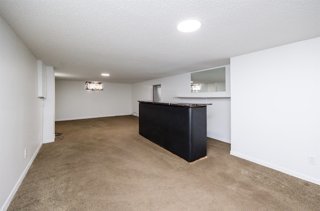 1667 NW 93rd Ct, Clive, IA 50325 - indoor bar featuring dark colored carpet, baseboards, recessed lighting, and a textured ceiling